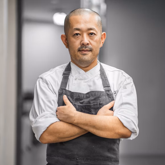 Chef Liam Smith, Sous Chef, preparing ingredients in professional kitchen